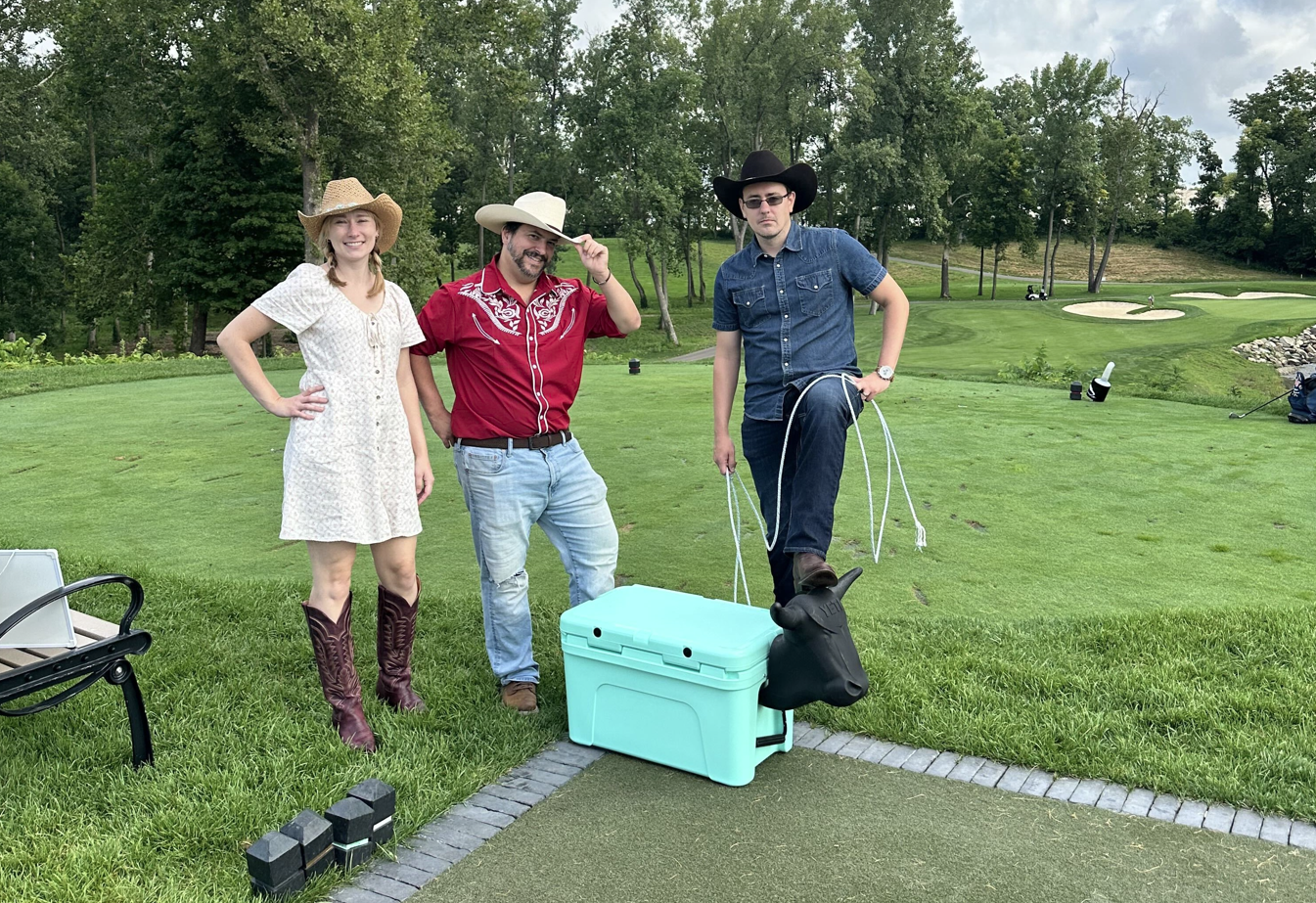 Ladderside Gang at the OCUF Golf outing with the YETI cooler steer